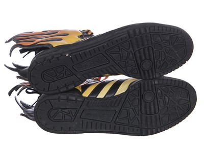 Lot 9 - A pair of Addidas by Jeremy Scott men's flame trainers, 2008