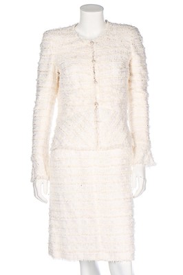 Lot 133 - A Chanel white cotton-tweed suit, 2005,...