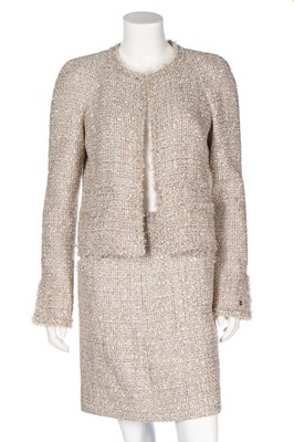 Lot 135 - A Chanel pale pink cotton tweed suit, 2005,...