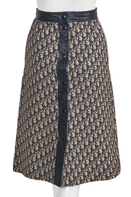 Lot 222 - A Christian Dior 'Trotter' logo-woven cotton A-line skirt, 1960s