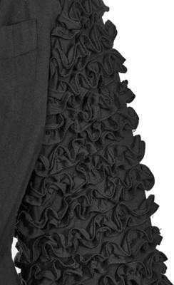 Lot 131 - A Jean Paul Gaultier black wool and cotton jacket, circa 1990