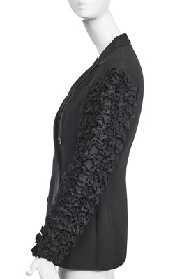 Lot 131 - A Jean Paul Gaultier black wool and cotton jacket, circa 1990