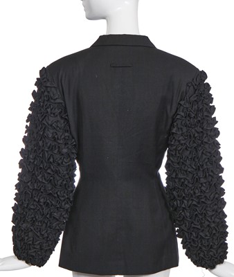 Lot 131 - A Jean Paul Gaultier black wool and cotton jacket, circa 1990