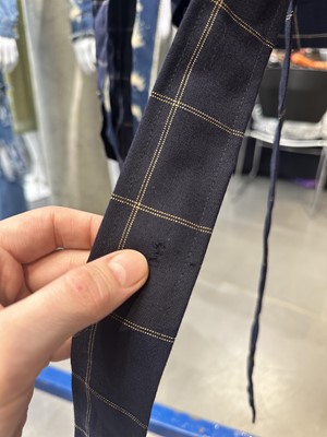 Lot 27 - A Vivienne Westwood men's checked navy wool bondage suit, 2000s