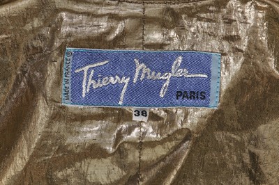 Lot 140 - A Thierry Mugler black velvet and gold lamé suit, circa 1`990