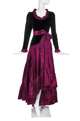 Lot 248 - An Yves Saint Laurent black velvet and purple taffeta evening gown, circa 1980