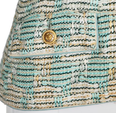 Lot 46 - A Gabrielle Chanel haute couture blue and white tweed jacket, circa 1970