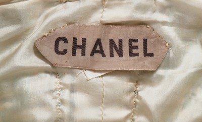 Lot 46 - A Gabrielle Chanel haute couture blue and white tweed jacket, circa 1970