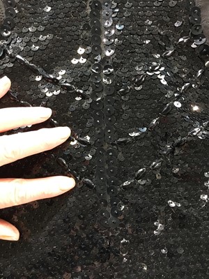 Lot 133 - A Jean Paul Gaultier black sequined viscose playsuit, circa 1990
