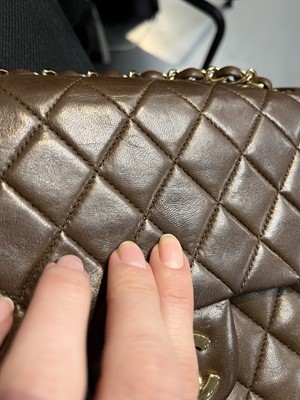 Lot 23 - A Chanel quilted chocolate brown lambskin leather classic flap bag, 2002-2003