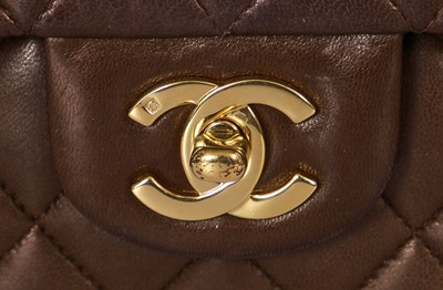 Lot 23 - A Chanel quilted chocolate brown lambskin leather classic flap bag, 2002-2003