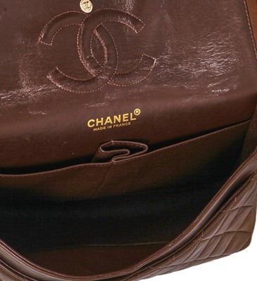 Lot 23 - A Chanel quilted chocolate brown lambskin leather classic flap bag, 2002-2003