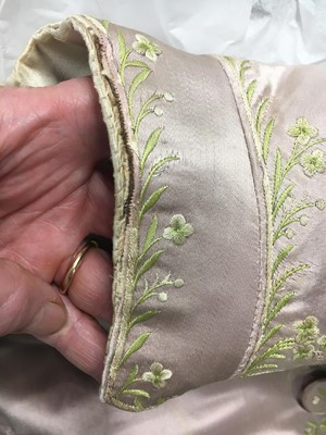 Lot 425 - A gentleman's embroidered pale lilac satin suit, probably French, circa 1780