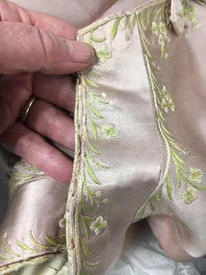 Lot 425 - A gentleman's embroidered pale lilac satin suit, probably French, circa 1780