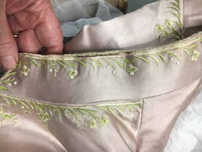 Lot 425 - A gentleman's embroidered pale lilac satin suit, probably French, circa 1780