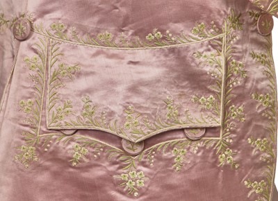 Lot 425 - A gentleman's embroidered pale lilac satin suit, probably French, circa 1780