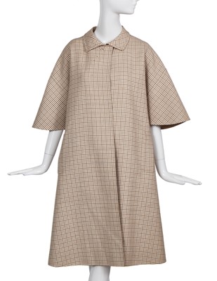 Lot 354 - A Madame Grès haute couture beige and white checked wool coat, 1960s