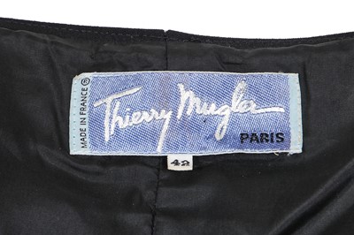 Lot 142 - A Thierry Mugler black wool jacket, 'Music Hall' collection, Autumn-Winter 1990-91