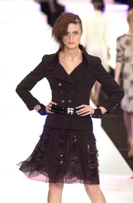 Lot 24 - A Chanel black wool suit, Spring-Summer 2001
