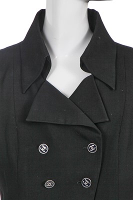 Lot 24 - A Chanel black wool suit, Spring-Summer 2001