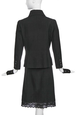 Lot 24 - A Chanel black wool suit, Spring-Summer 2001