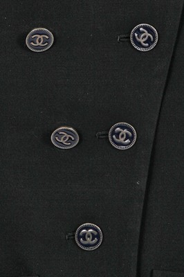 Lot 24 - A Chanel black wool suit, Spring-Summer 2001
