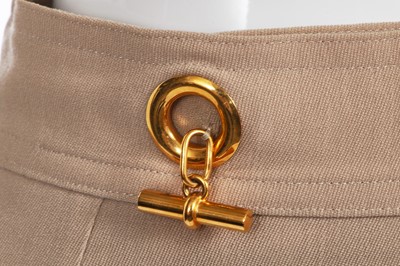 Lot 28 - Two Chanel blouses and an Hermès skirt, 2000s