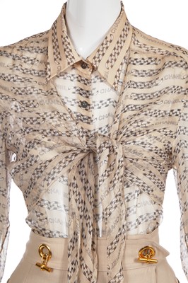 Lot 28 - Two Chanel blouses and an Hermès skirt, 2000s