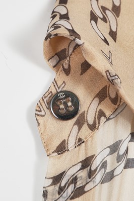 Lot 28 - Two Chanel blouses and an Hermès skirt, 2000s