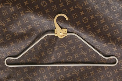 Lot 61 - A Louis Vuitton monogrammed canvas garment bag, 1990s