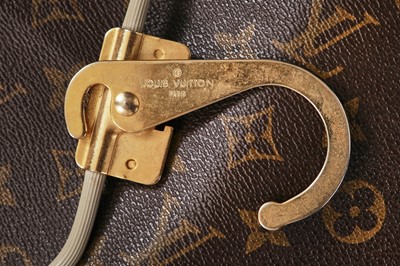 Lot 61 - A Louis Vuitton monogrammed canvas garment bag, 1990s