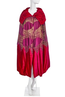 Lot 410 - A Harvey Nichols pink and purple satin and velvet opera cape, circa 1925