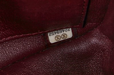 Lot 43 - A Chanel red caviar leather quilted small CC filigree flap bag, 2016-2017