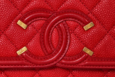 Lot 43 - A Chanel red caviar leather quilted small CC filigree flap bag, 2016-2017