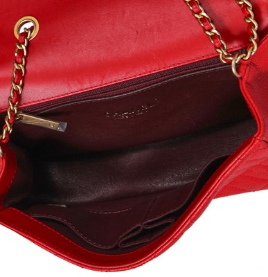 Lot 43 - A Chanel red caviar leather quilted small CC filigree flap bag, 2016-2017