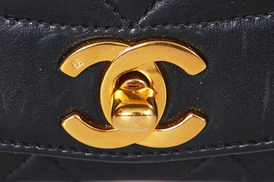 Lot 29 - A Chanel navy lambskin 'Diana' bag, circa 1992