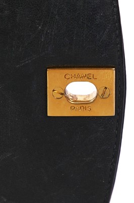 Lot 29 - A Chanel navy lambskin 'Diana' bag, circa 1992