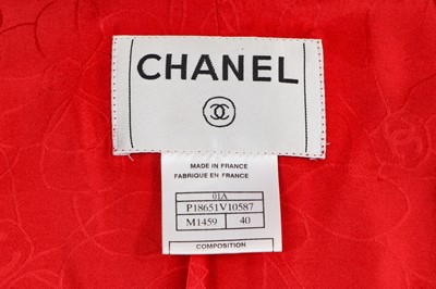 Lot 32 - A Chanel red and white speckled bouclé wool-blend suit, Autumn-Winter 2001-02