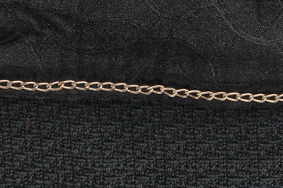 Lot 34 - A Chanel black cotton-blend suit, Spring-Summer 2007