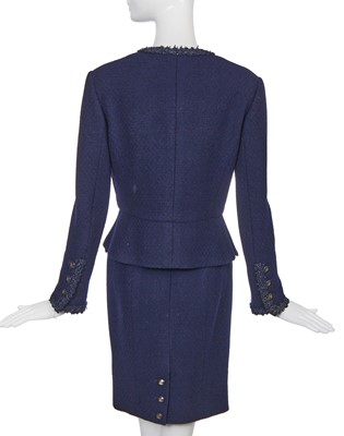 Lot 47 - A Chanel navy blue wool bouclé suit, Cruise 1995