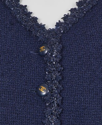 Lot 47 - A Chanel navy blue wool bouclé suit, Cruise 1995