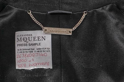 Lot 72 - An Alexander McQueen by Sarah Burton black rayon tailcoat, Spring-Summer 2011