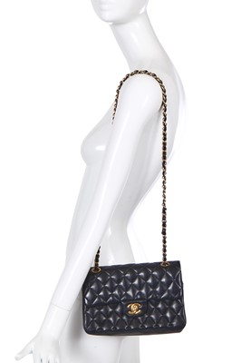 Lot 48 - A Chanel quilted black lambskin leather classic double flap bag, 2010-2011