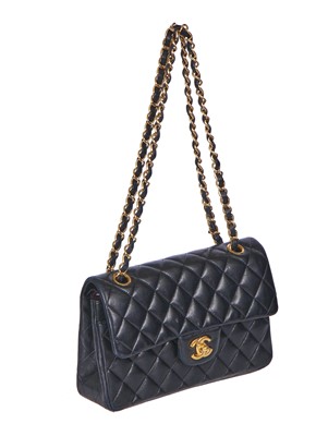 Lot 48 - A Chanel quilted black lambskin leather classic double flap bag, 2010-2011