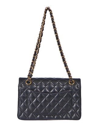Lot 48 - A Chanel quilted black lambskin leather classic double flap bag, 2010-2011