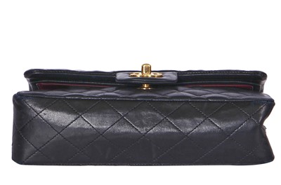 Lot 48 - A Chanel quilted black lambskin leather classic double flap bag, 2010-2011