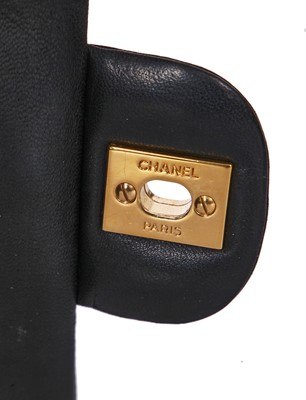Lot 48 - A Chanel quilted black lambskin leather classic double flap bag, 2010-2011