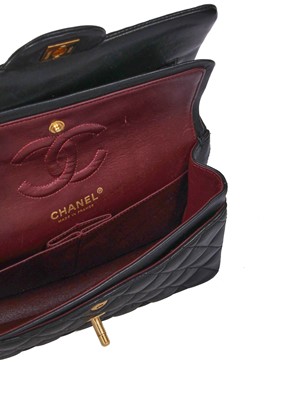 Lot 48 - A Chanel quilted black lambskin leather classic double flap bag, 2010-2011