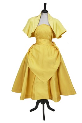 Lot 387 - A Robert Piguet haute couture canary yellow silk faille cocktail dress, circa 1950