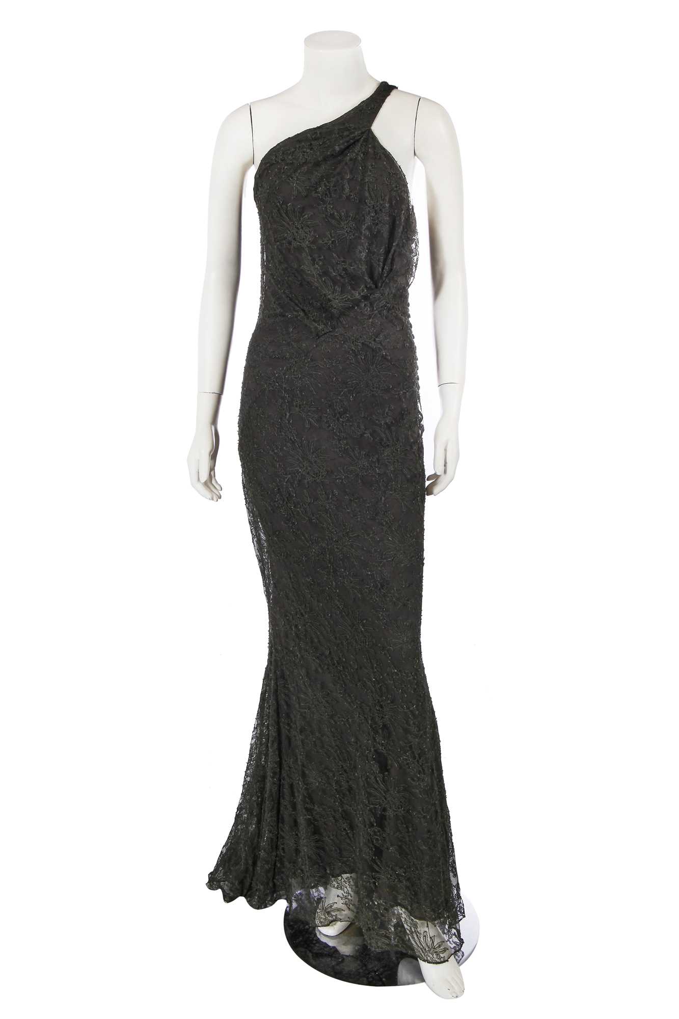 Lot 240 - A John Galliano green lace evening gown, commercial collection 2007